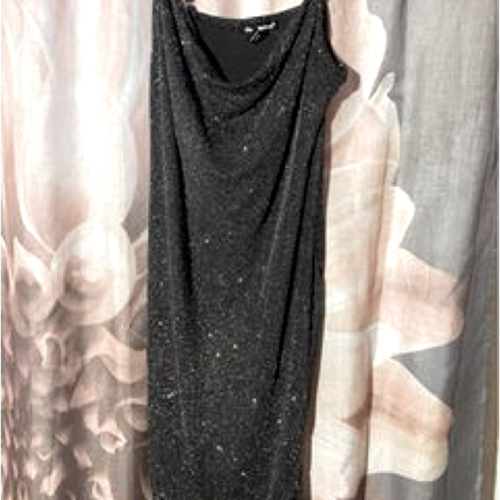 Woman’s sparkly black and silver mini dress size Large